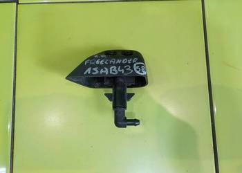 LAND ROVER FREELANDER II 06r spryskiwacz lampy lewy