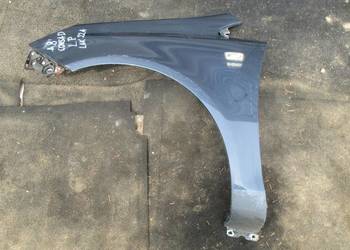 OPEL CORSA D 13r HB 5D błotnik lewy przód