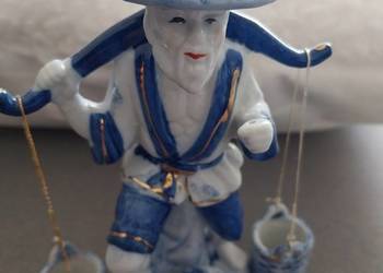 Porcelanowa figurka azjatyckiego rybaka