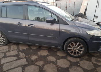 Mazda 5 blotnik  przód 2009r