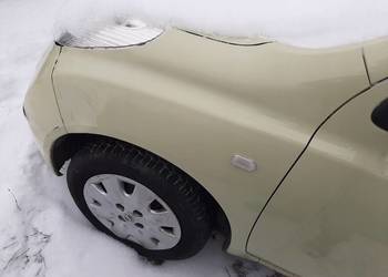 BŁOTNIK LEWY PRZÓD NISSAN MICRA K12 HB 3D 03+