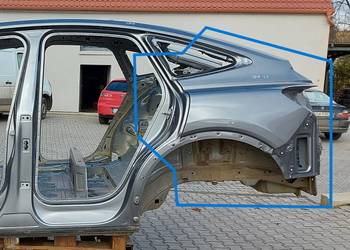 Audi Q4 E-TRON 89A 89E Sportback ĆWIARTKA BŁOTNIK LEWY TYŁ  szary LZ7F