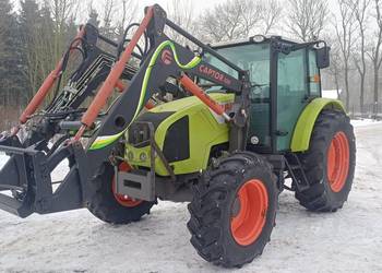 Claas Axos 320 z ładowaczem czołowym Faucheux Captor 100