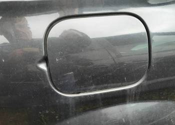 Klapka wlewu paliwa Renault Megan ll NV676