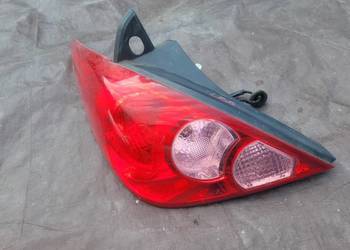 NISSAN TIIDA 5D LAMPA TYŁ LEWA 26555EM01A HELLA ORYGINAŁ // 288
