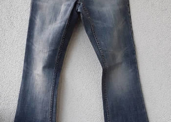 Spodnie jeans r 8/34R z rozszerzoną nogawką Oasis