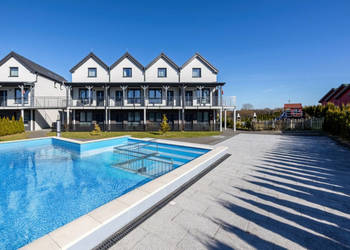 Idealny na Inwestycję – Dwupoziomowy Apartament z Basenem Nad Bałtykiem