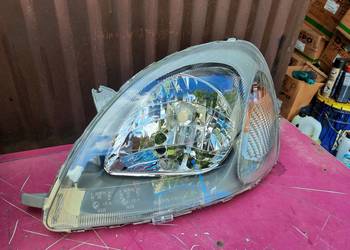 Toyota Yaris 99r lampa przednia lewa nowa