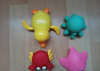 Kaczka nakręcana i gumowe zabawki pływające