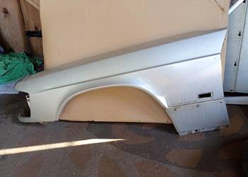 MERCEDES W201 BŁOTNIK LEWY PRZÓD