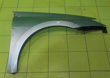 RENAULT LAGUNA III 08r HB 5D blotnik prawy przod