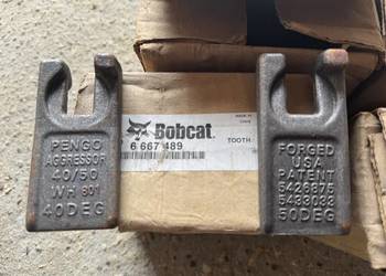 Ząb do wiertnicy bobcat auger tooth 50szt