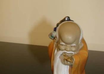 porcelanowa figurka mnicha sygnowna