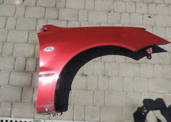 MITSUBISHI LANCER 7 BŁOTNIK PRAWY PRZÓD