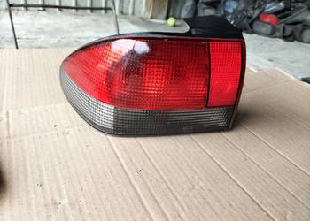 SAAB 900 LAMPA TYŁ TYLNA LEWA
