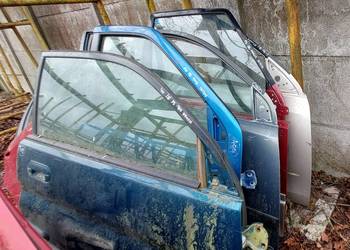 MAZDA DEMIO DRZWI PRAWE  PRZÓD GOŁE