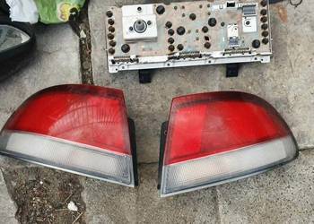Lampa tylna prawa + lewa narożna w błotnik Mazda 626 sedan GE 91-97