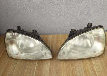 Lampa przód lewa+ tył prawa lewa KIA Carens II 2.0 CRDI EU 04r Lampa przód lewa+ tył prawa lewa KIA Carens II 2.0 CRDI EU 04r