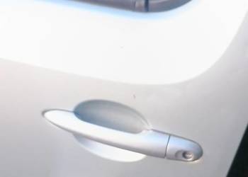 Renault Kangoo II 2 klamka lewa podstawa zewnętrzna teb64 srebrna