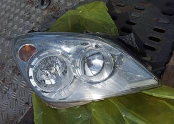 Lampa prawa Opel Astra H hella gm 1EG270 370-52 oryginał