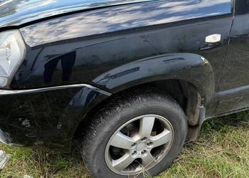 Błotnik Lewy Przód HYUNDAI TUCSON 2004-2010r bez listew poszerzeń EB