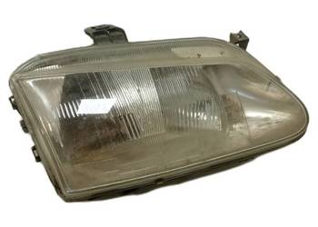 Reflektor przedni prawy Renault 7701672735 lampa przednia używana