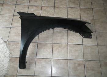 VW PASSAT B7 B 7 blotnik prawy