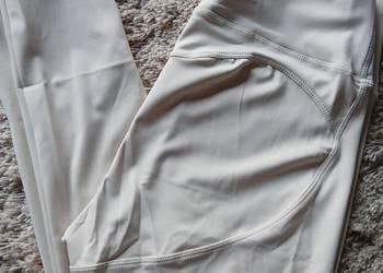 Sportowe leginsy bezowe L/xl