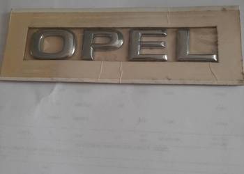 EMBLEMAT,ZNACZEK -TYŁ ,,OPEL"