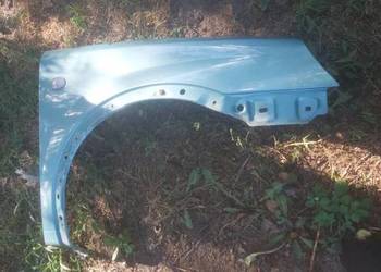 Blotnik przód lewy OPEL CORSA  C zielony  metalic  bez Blotnik przód lewy OPEL CORSA  C zielony  metalic  bez