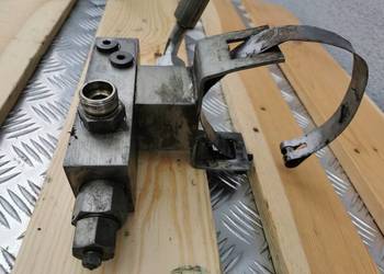 Zamek hydrauliczny siłownika Mecalac 12 MXT