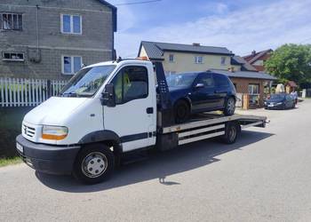 Pomoc drogowa autolaweta holowanie transport pojazdów i maszyn