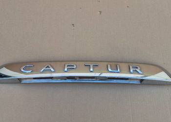 RENAULT CAPTUR LISTWA CHROM LOGO KLAPY BAGAŻNIKA 848101327R