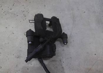 ZACISK HAMULCOWY LEWY TYŁ VW PASSAT B8 3Q0615405
