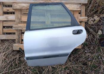Drzwi lewe tylne lewy tył Volvo v40 96-04 329-52 srebrne
