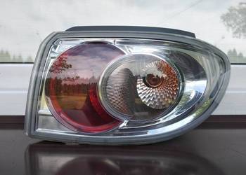 Mazda 2 DY LIFT FL lampa tył tylna prawa w błotnik oryginał Hella