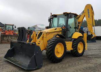na równych kołach Komatsu WB 93S-5E0 Bez Luzów Zadbana Sprawna Super Stan …