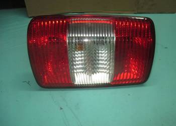 VOLKSWAGEN CADDY III 10r lampa lewa tył 2K0945258A