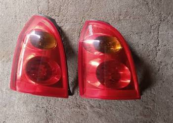 Lampy tył prawa lewa primera P12 kombi