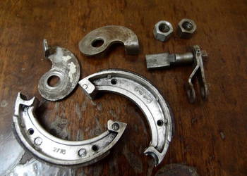 Rozpierak szczęk hamulcowych wraz z dźwignią Romet