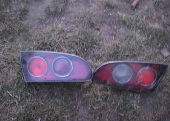 Lampa tylna prawa + lewa w klapę Seat Ibiza III  uszkodzona