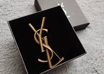 Używana broszka YSL Saint Laurent Paris w kolorze złotym
