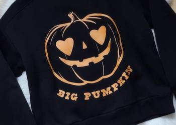 Czarna ocieplana bluza Sinsay roz.L dynia Halloween