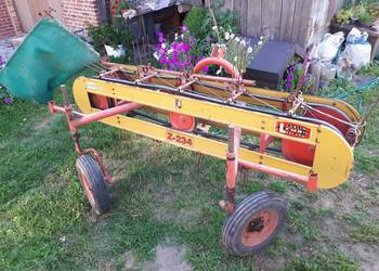 Przetrząsaczo zgrabiarka taśmowa