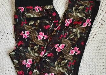 Nowe spodnie haremki Cropp L 40 wzór kwiaty floral exotic