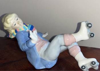 Figurka chłopca. Wrotkarz. Wrotki. Rex. Valencia Figurka chłopca. Wrotkarz. Wrotki. Rex. Valencia