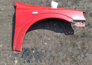 BŁOTNIK PRAWY PRZÓD OPEL ASTRA G