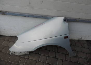 BŁOTNIK LEWY PRZEDNI RENAULT SCENIC 1 FL MV632