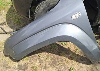 Blotnik  lewy Vw Amorok  r2011 pick-up