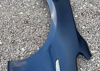 Opel Astra IV Błotnik lewy kod lakieru : Z168